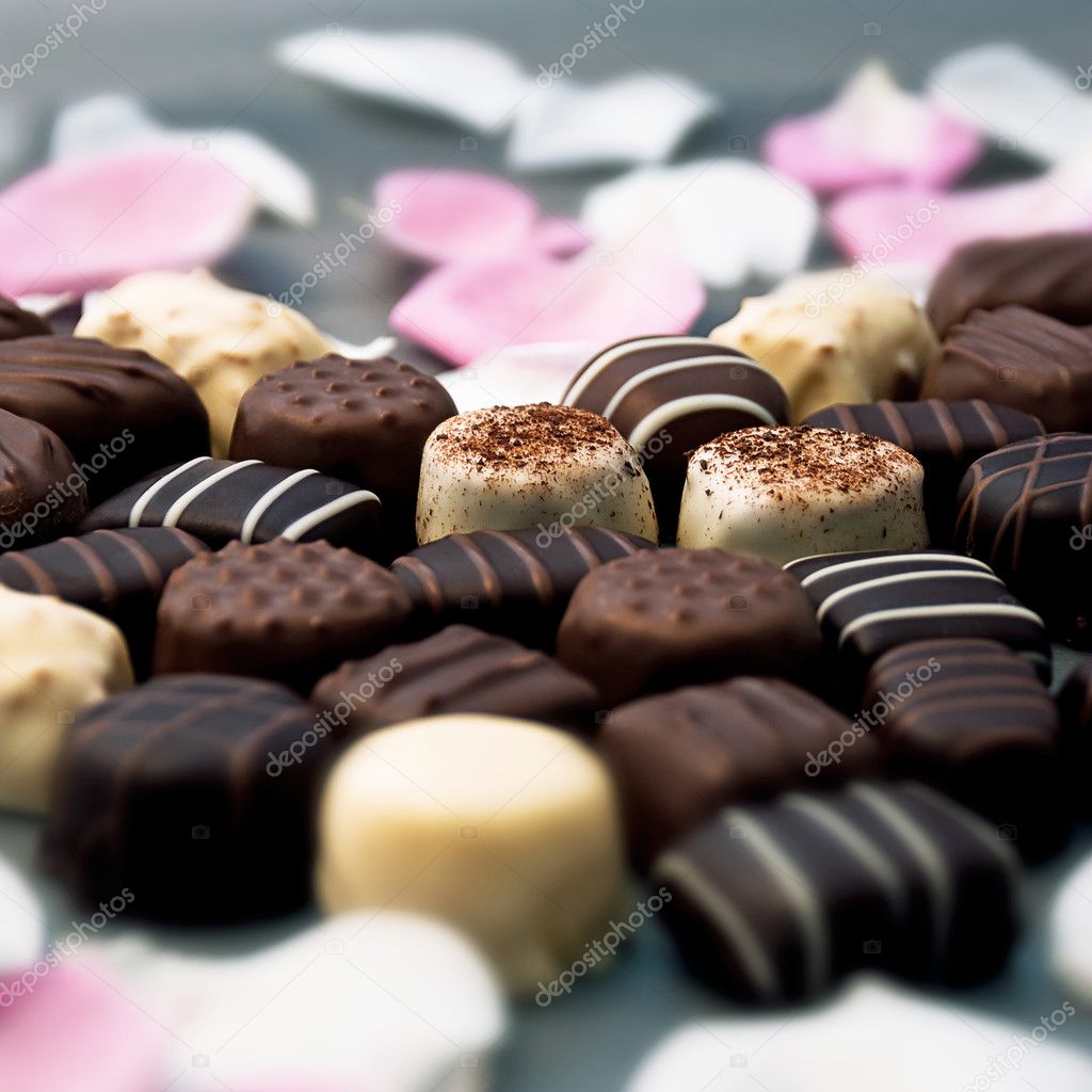 Chocolate truffles and rose petals