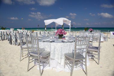 Wedding setting on tropical island beach clipart