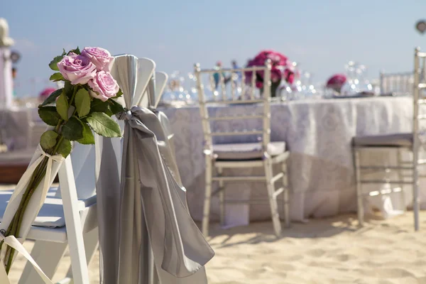 Rose's on a silver chair — Stock Photo, Image