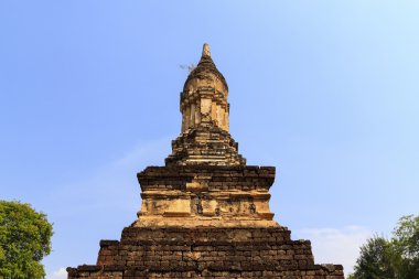 Top of pagodas in Temple. Sukhothai Historical Park, Thailand clipart