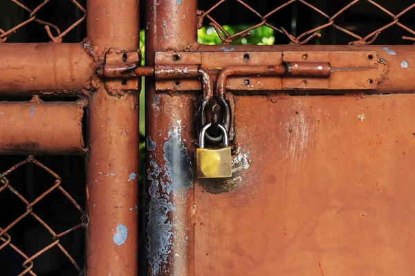 stock image Iron padlock on old door