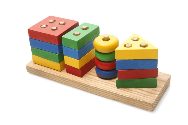 Holzspielzeug auf weißem Hintergrund — Stockfoto