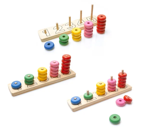 Holzspielzeug auf weißem Hintergrund — Stockfoto