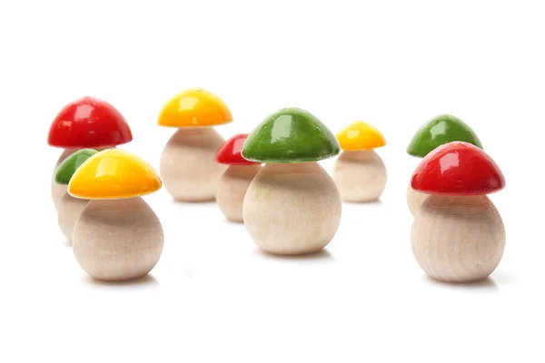 Wooden mushrooms on white background — Stock Photo, Image