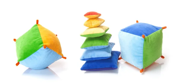 Brinquedos de cor suave no fundo branco — Fotografia de Stock