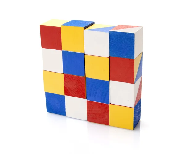 Coloridos bloques de madera sobre fondo blanco — Foto de Stock