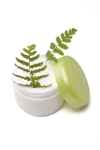 Cosmetic cream with leaf — Stock Photo, Image