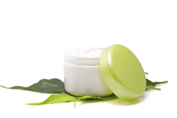 stock image Cosmetic cream with leaf