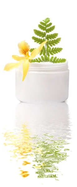 Cosmetic cream with flower — Stock Photo, Image