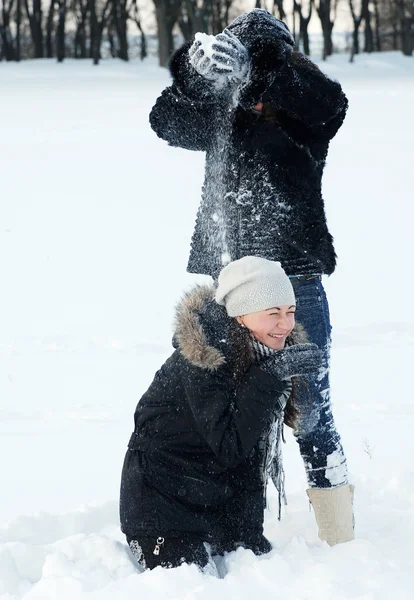 stock image Two sisters playing with snow