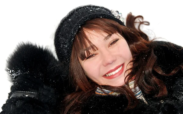 Junge schöne Frau mit Schnee — Stockfoto