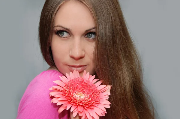 stock image Young beautiful woman with flower