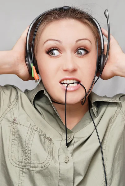 Young beautiful woman with headset — Stock Photo, Image