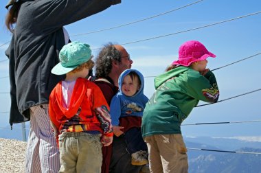 Family in the mountains. clipart