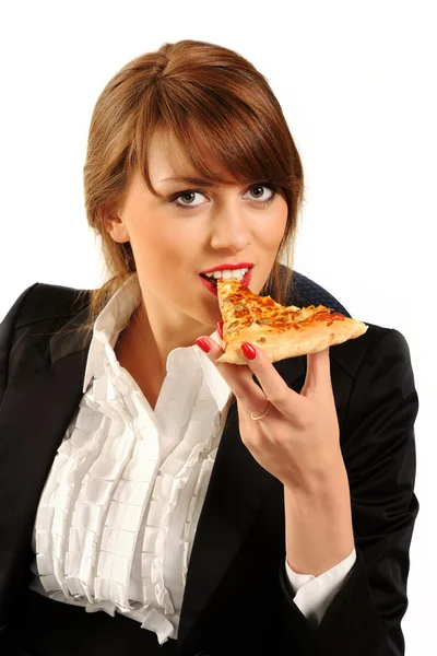 Young happy business woman eating pizza Royalty Free Stock Photos