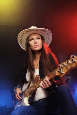 Young woman with guitar clipart