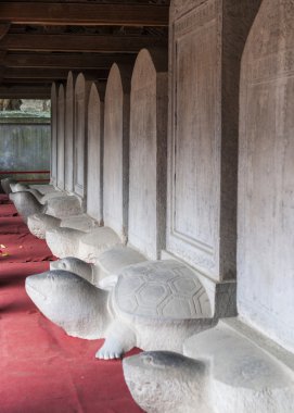 Hall with stelae built on turtles in Temple of Literature. clipart