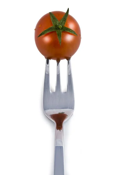 Körsbär tomat på en gaffel — Stockfoto