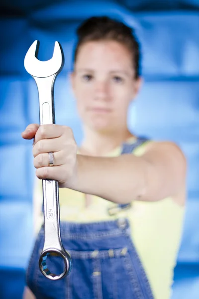 Stock image Woman holding wrench