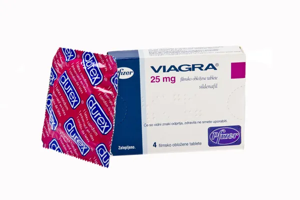 stock image Viagra pills tablets with durex condom