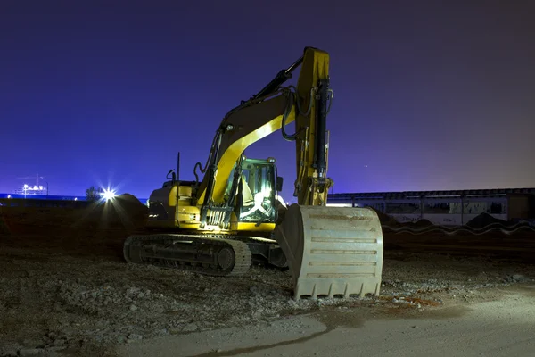 夜の掘削機 — ストック写真