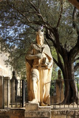 Statue of King Alfonso XI in the Alcazar of Cordoba clipart