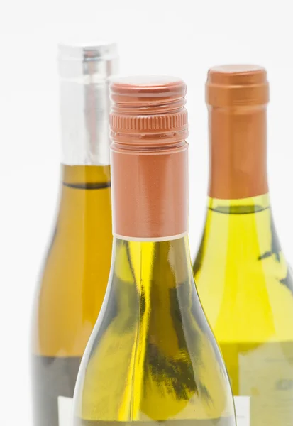 Three bottles of white wine — Stock Photo, Image