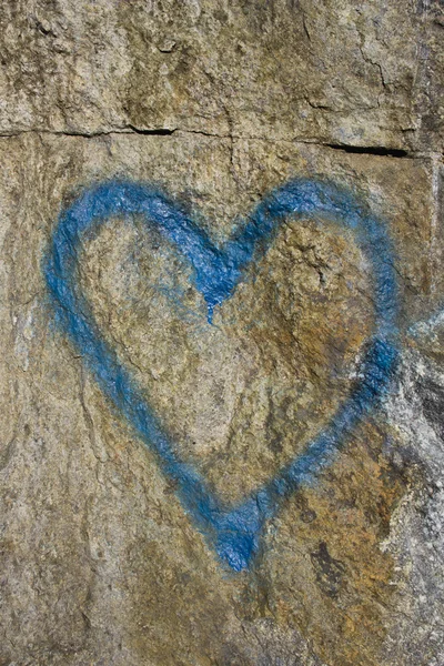 stock image Rock surface with a blue heart