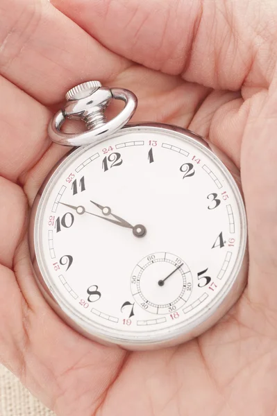Hand holding an old pocket watch — Stock Photo, Image