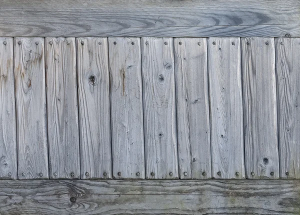 Background of old gray weathered knotted wooden wall — Stock Photo, Image