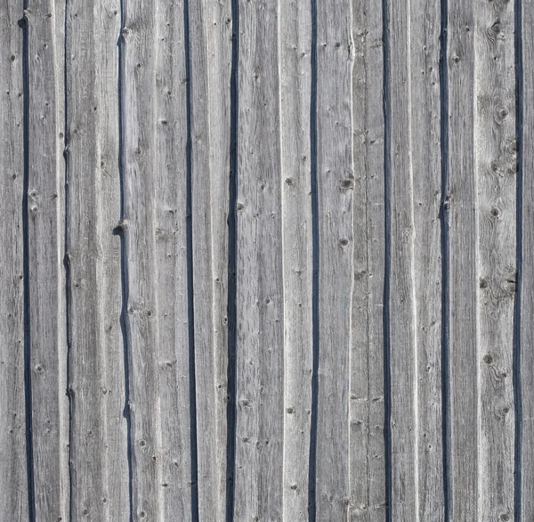 Arrière-plan de vieux gris altéré mur en bois noué — Photo