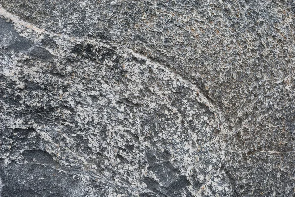 A superfície da pedra de granito. Pode ser usado como fundo — Fotografia de Stock