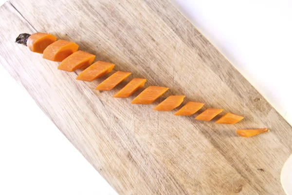 Carrot Sliced on a Wooden Chopping Board — Stock Photo, Image