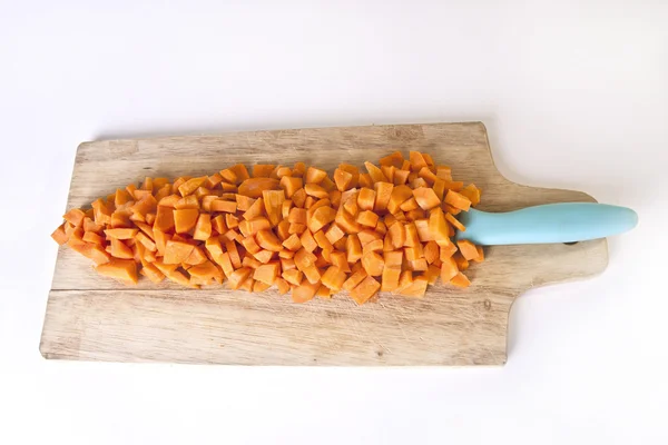 Chopped Carrots on Wooden Board — Stock Photo, Image