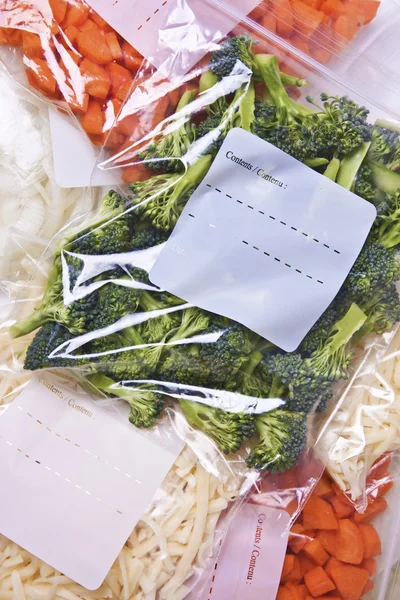 Légumes hachés dans des sacs de congélation Images De Stock Libres De Droits
