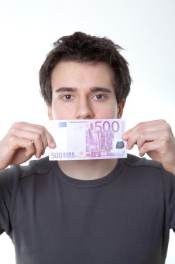 Young man with a banknote on his mouth clipart