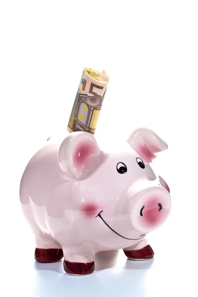 Piggy bank with a 50 euro banknote in the slot — Stock Photo, Image