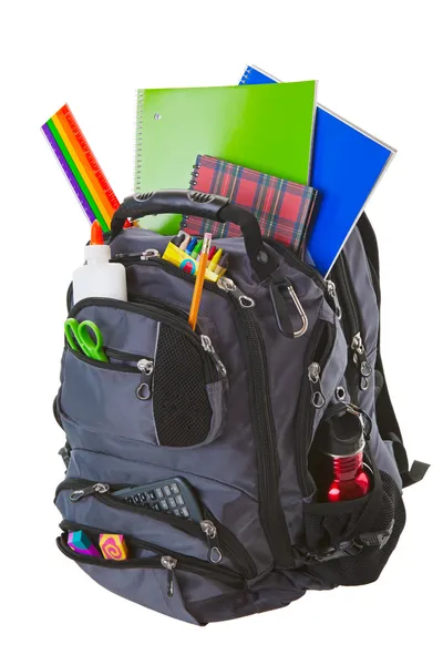 Okul malzemeleriyle dolu sırt çantası. Telifsiz Stok Imajlar