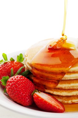 Syrup Pouring on Pancakes clipart