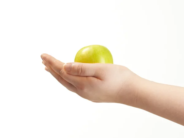 Manzana en las palmas de las manos de los niños Fotos De Stock