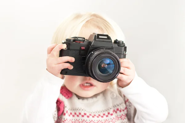 Παιδί με μια φωτογραφική μηχανή Εικόνα Αρχείου
