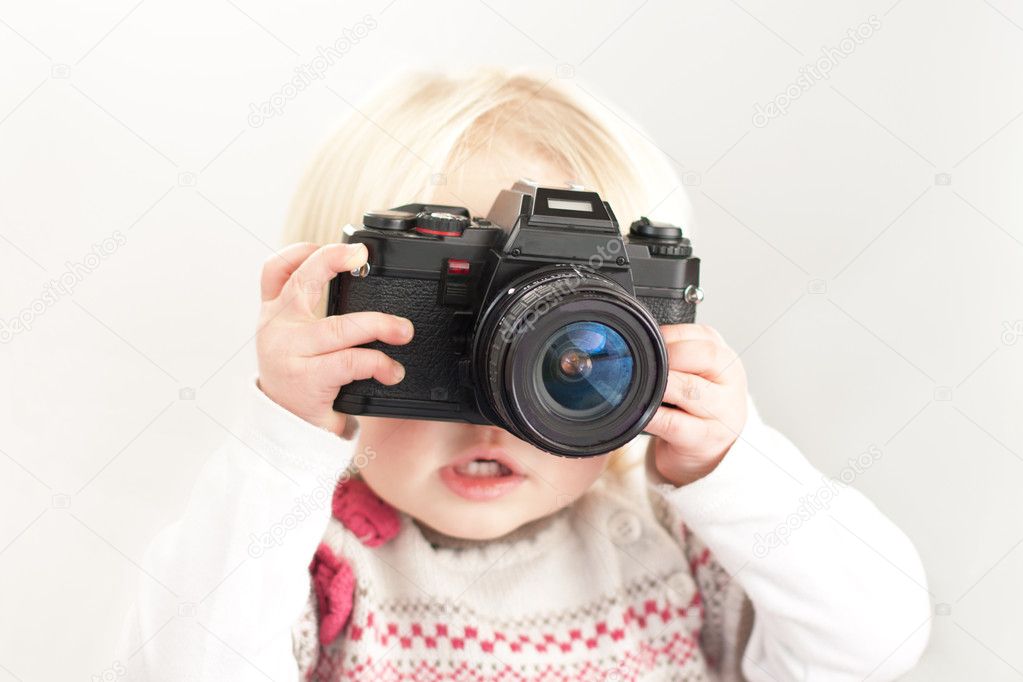 Child with a camera