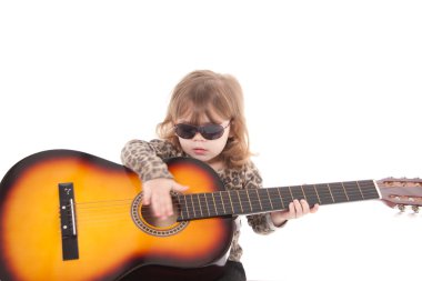 Child with a guitar clipart