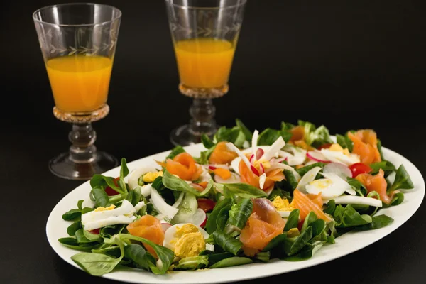 Healthy food- salmon and vegetable with orange carrot juice — Stock Photo, Image