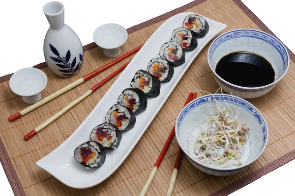 Sushi and soy sauce with sake and served with chopsticks — Stock Photo, Image