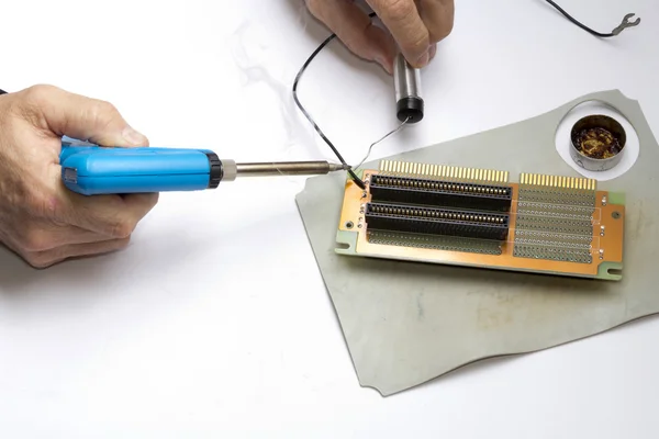 Soldering electronic component — Stock Photo, Image