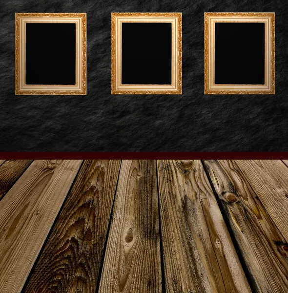 Rahmen und schwarze Steinmauer — Stockfoto