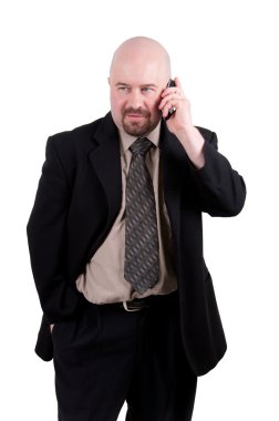 Businessman on cellphone clipart