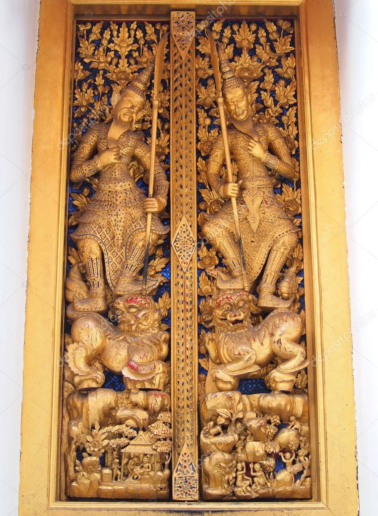 Thai molding art on door of the temple