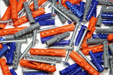 Orange Blue and grey dowels with self-tappings clipart